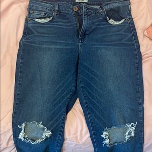 Exposed Knees Blue Jeans